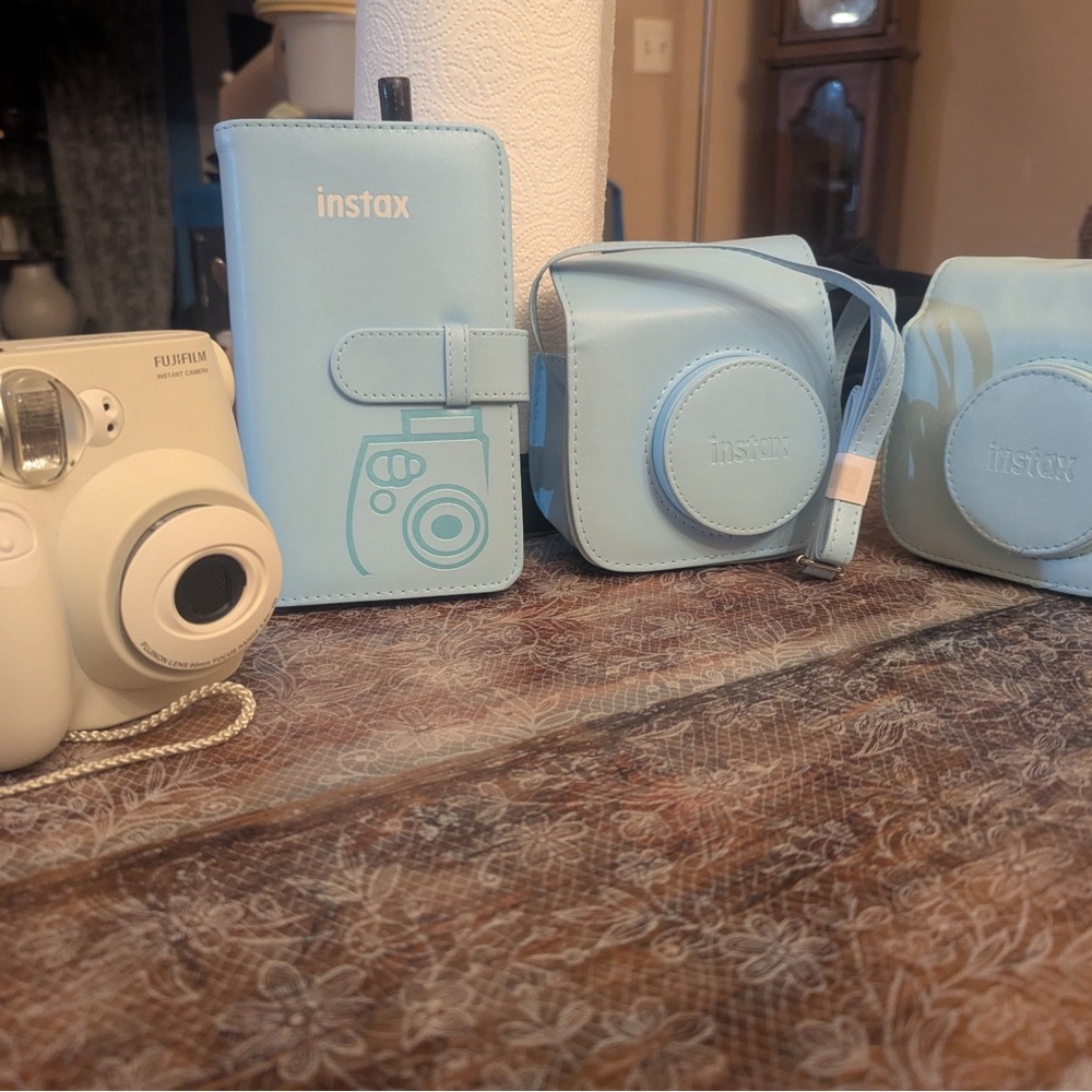 Fujifilm Instax Mini Camera with Blue Case and mini wallet album